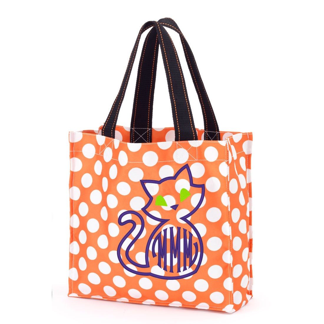 Orange polka-dot trick-or-treat bag with a purple embroidered cat outline, green eyes and a monogram inside