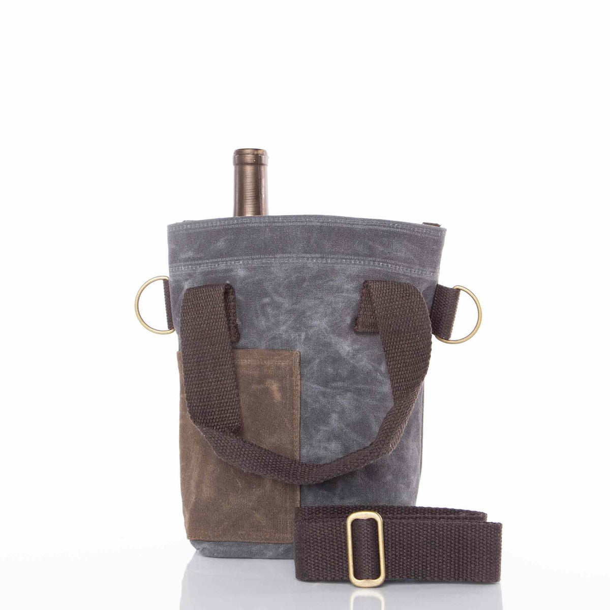 Gray waxed canvas wine bottle tote with brown leather pocket, dark brown canvas handles, brass D-ring details, and detachable shoulder strap