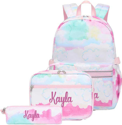 Personalized backpack, lunchbox, and pencil bag set with a pink and blue cloud pattern and the name Kayla.