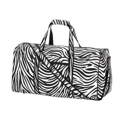 Black and white zebra-print duffel with handles and long shoulder strap