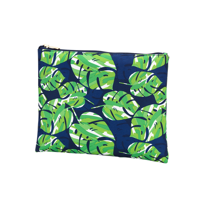 Green tropical-leaf pouch on a navy background