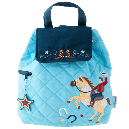 Light blue quilted Stephen Joseph cowboy backpack with embroidered cowboy on horse, horseshoe, sheriff star charm, and brown boot monogram on front pocket