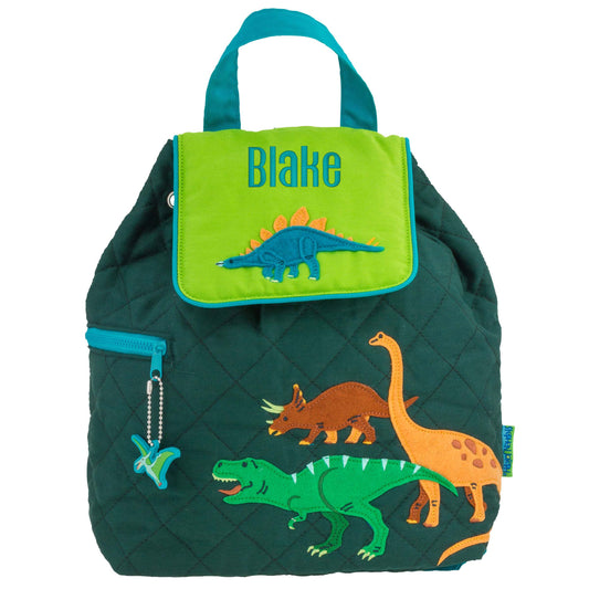 Green Dino quilted backpack, close-up of embroidered design detail