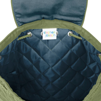 Inside view of quilted blue Stephen Joseph backpack with olive green trim, drawstring closure, and white brand label stitched at top