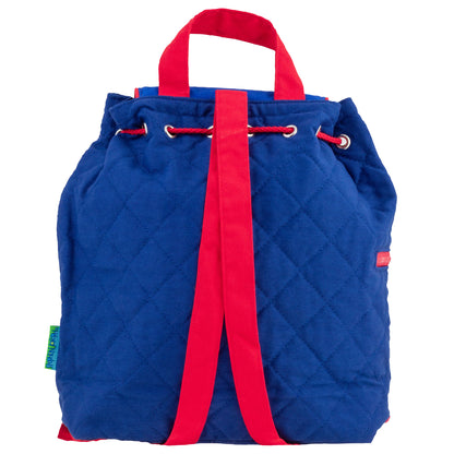 Blue quilted backpack with red drawstring straps, red top handle, and red side straps; Stephen Joseph brand tag visible on lower left corner