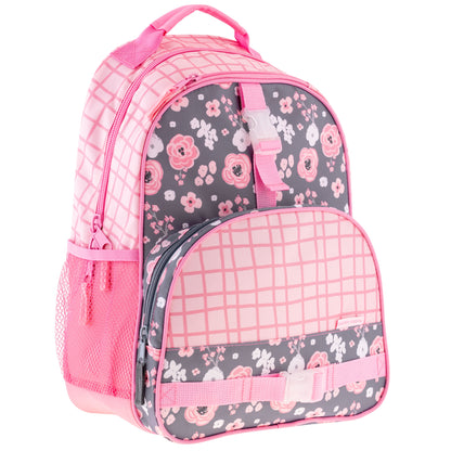 Pink and charcoal Stephen Joseph backpack with floral all-over print, pink grid front pocket, mesh side pocket, and adjustable straps