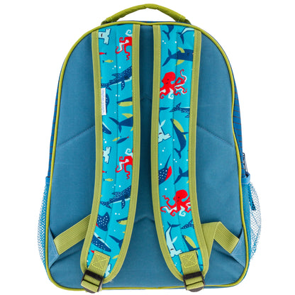 Blue Stephen Joseph backpack with shark all-over print, showing back view with sea creature patterned shoulder straps and lime green trim