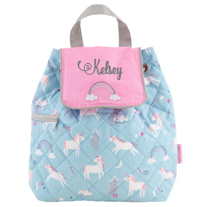 Quilted blue unicorn backpack with pink rainbow flap, gray handle, side zipper, and name embroidery