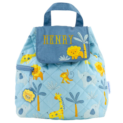 Light blue quilted backpack with safari animal print, monogrammed flap, zipper pocket and lion charm