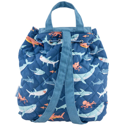 Navy quilted backpack with colorful sharks, whales and octopuses, drawstring top, flap and carry handles