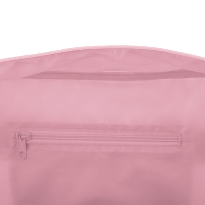 Interior view of a pink duffle bag showing a mesh pocket and a zippered compartment.