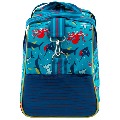 Turquoise duffle bag with shark and octopus pattern, blue striped pocket, and blue handles.