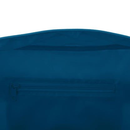 Inside view of a solid blue duffle bag showing a horizontal zippered pocket and top zipper.