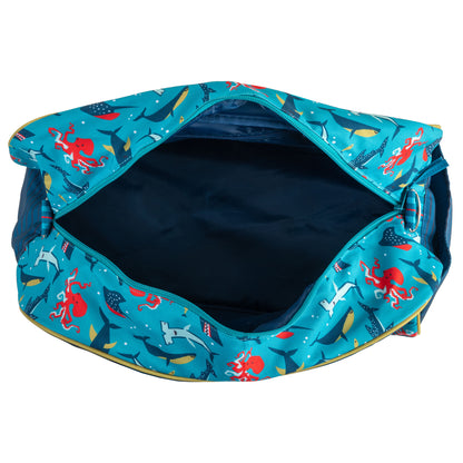 Open teal duffle bag featuring a shark and octopus pattern with a dark navy interior.