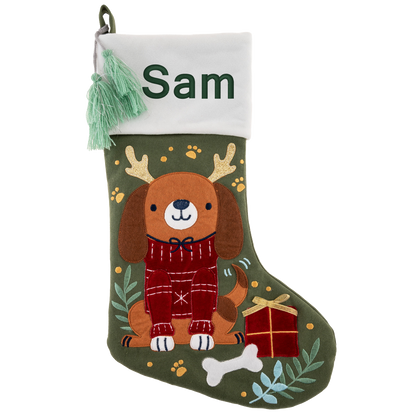 Olive green stocking with brown dog in red sweater, embroidered name Sam on white cuff with mint tassel.