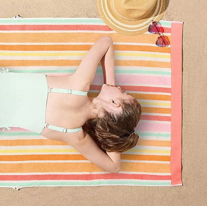 Personalized coral striped Sunwash kids beach towel 30 x 60 inches detail view