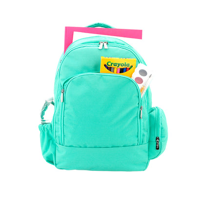 Mint kids backpack holding a folder and school supplies