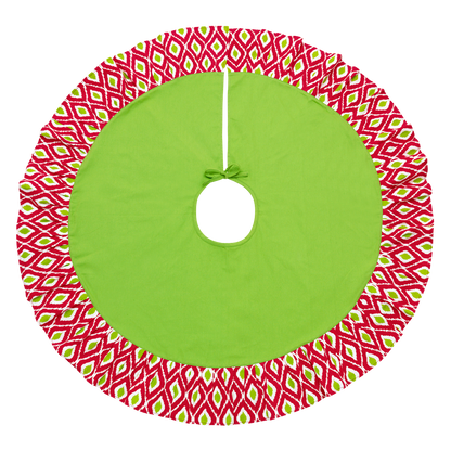 Round green Christmas tree skirt with red and white ikat border and center opening shown flat
