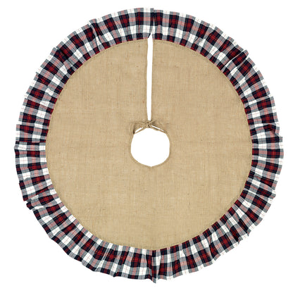 Round natural burlap Christmas tree skirt with black white and red plaid ruffle shown flat