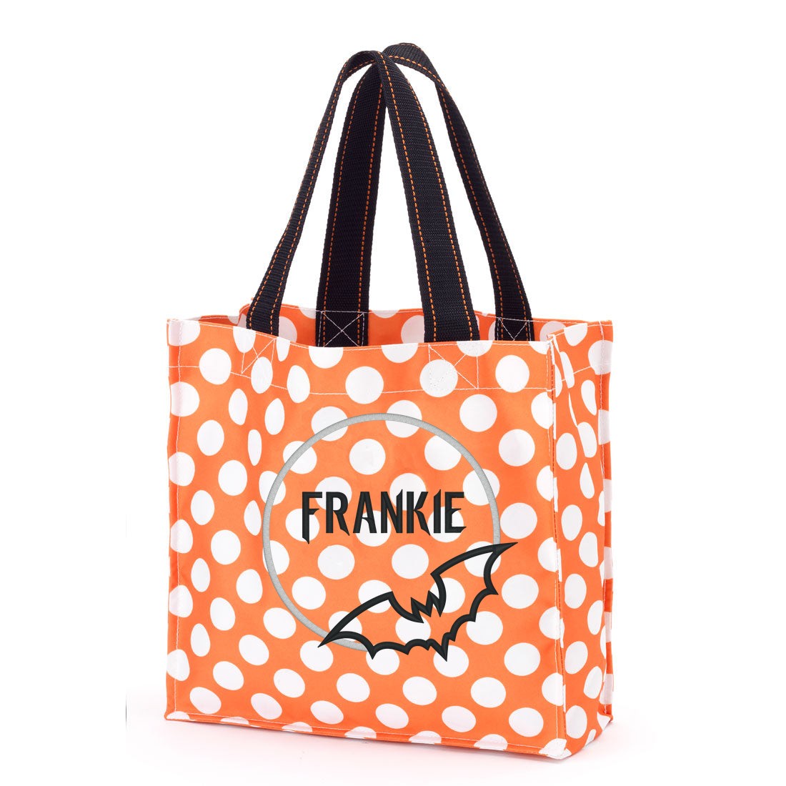 Orange polka-dot trick-or-treat bag with an embroidered silver moon, a black bat and "FRANKIE" in black lettering