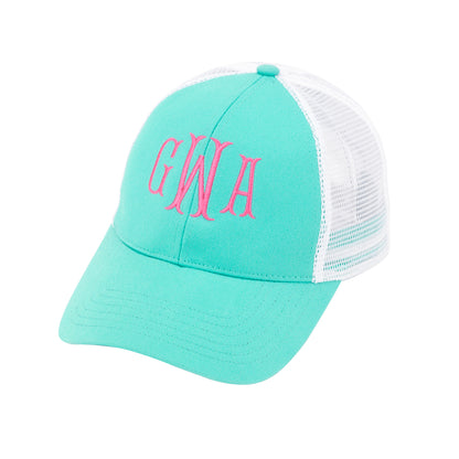 Mint trucker hat with pink initials and white mesh back
