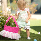 kid with hot pink tutu bucket bag