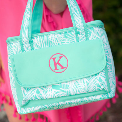 Poolside Palm cooler bag with a pink initial on the mint front panel