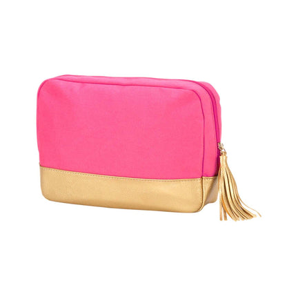 Hot pink Cabana cosmetic bag with gold-colored trim and tassel