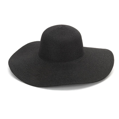 Black wide-brim floppy hat on a white background