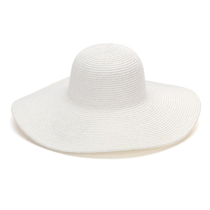 White wide-brim floppy hat on a white background
