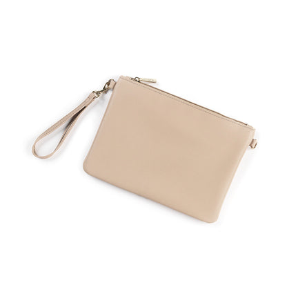 Beige leather wristlet with a matching strap and gold-tone hardware.