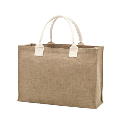 Natural burlap-look tote with cream handles
