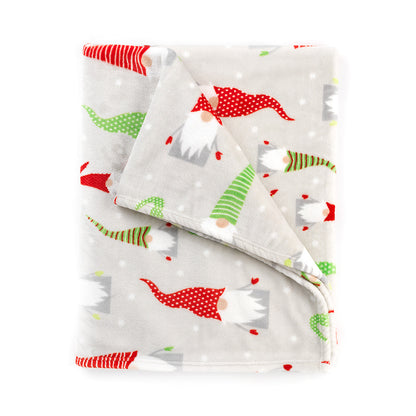 Folded gray blanket with holiday gnome print