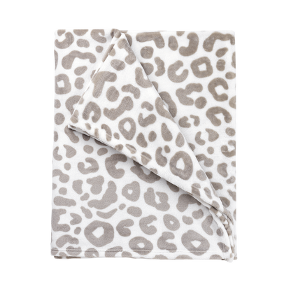 Folded gray and white leopard-print blanket