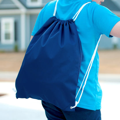 Blue drawstring bag worn over a matching shirt