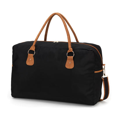 Black duffel with tan handles and trim on a white background