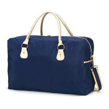 Solid navy duffel with pale contrasting handles