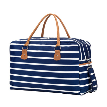 Navy and white striped duffel with tan handles