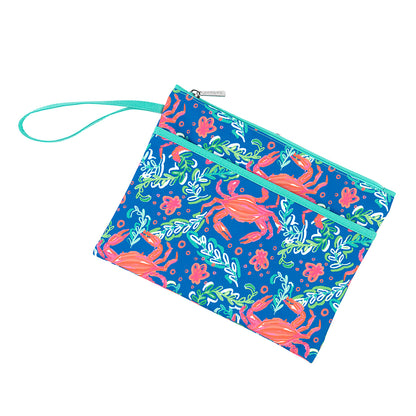 Blue coastal-print wristlet pouch with a mint loop