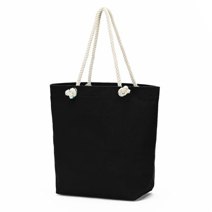 Black Castaway tote with white rope handles on a white background