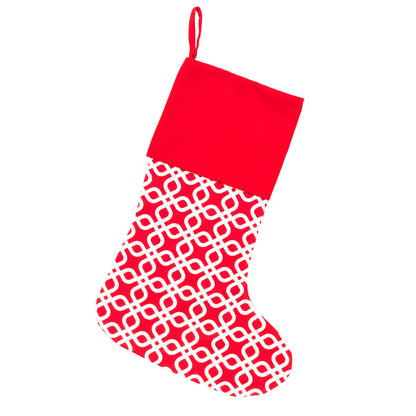 Red and white geometric Christmas stocking with red cuff on white