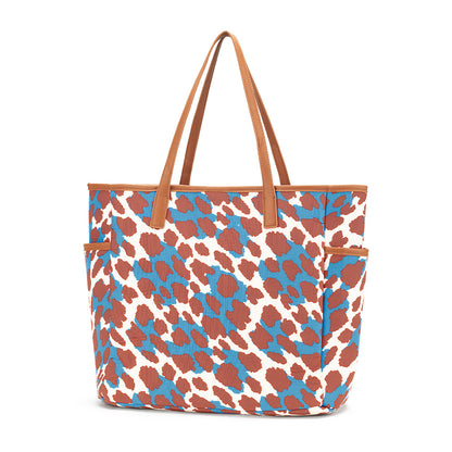 Blue and brown animal-print shoulder tote with tan handles
