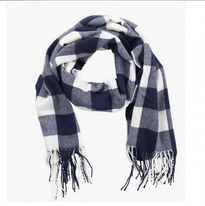 Navy blue and white buffalo check scarf with fringed ends, coiled in a loop.