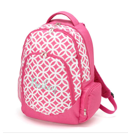 Pink preschool backpack with a white geometric floral pattern