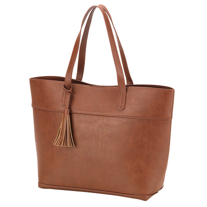 Camel Aubrey tote with tassel on a white background