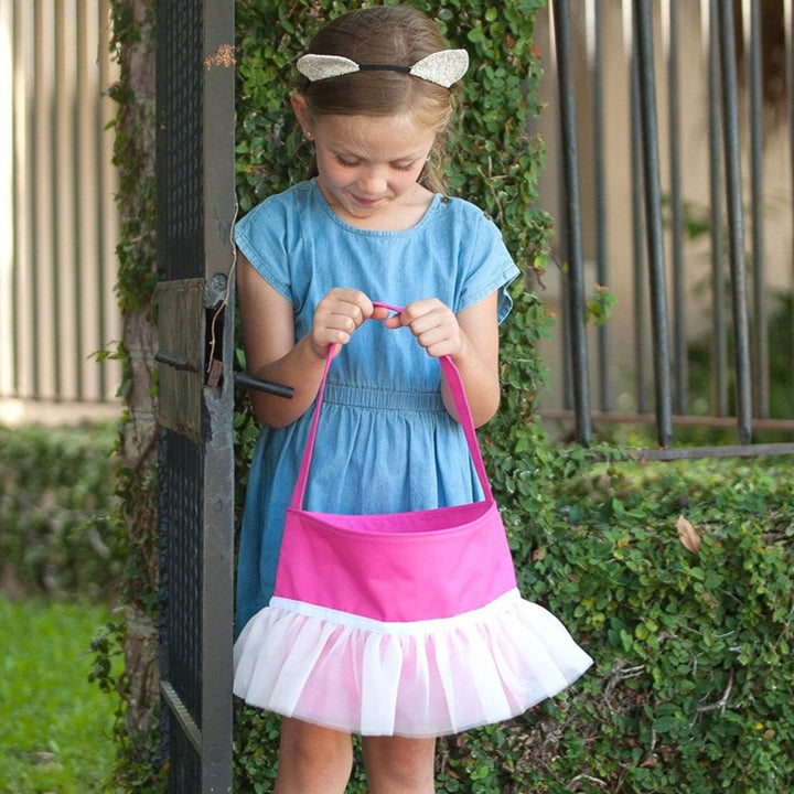 girl with hot pink tutu bucket bag