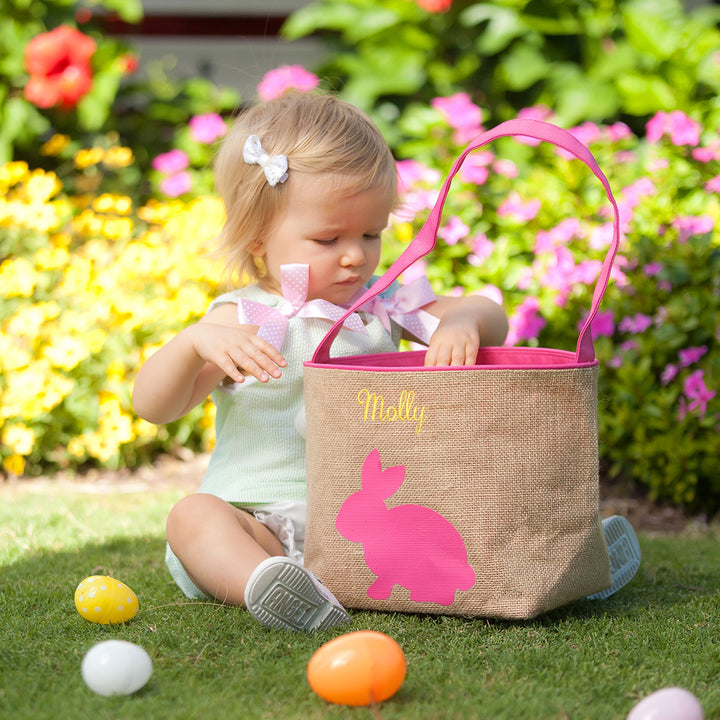 kid with hot pink burlap Easter basket