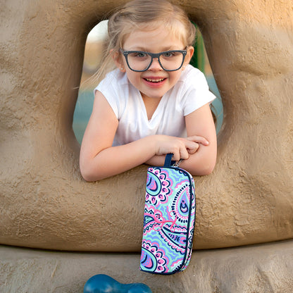 Child holding a paisley patterned pencil case at a playground