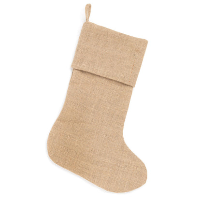 Plain natural burlap Christmas stocking with folded cuff and hanging loop on a white background